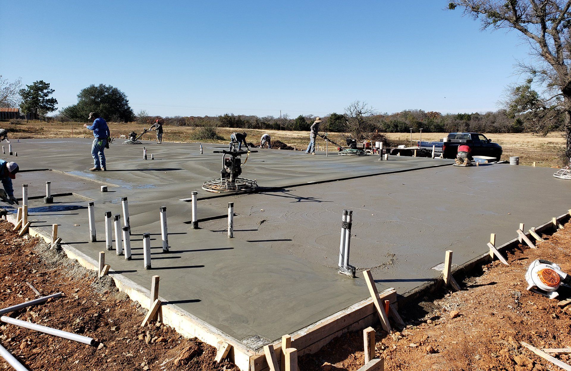 The Foundation Doctor crew finishing a slab foundation in southern McLennan County