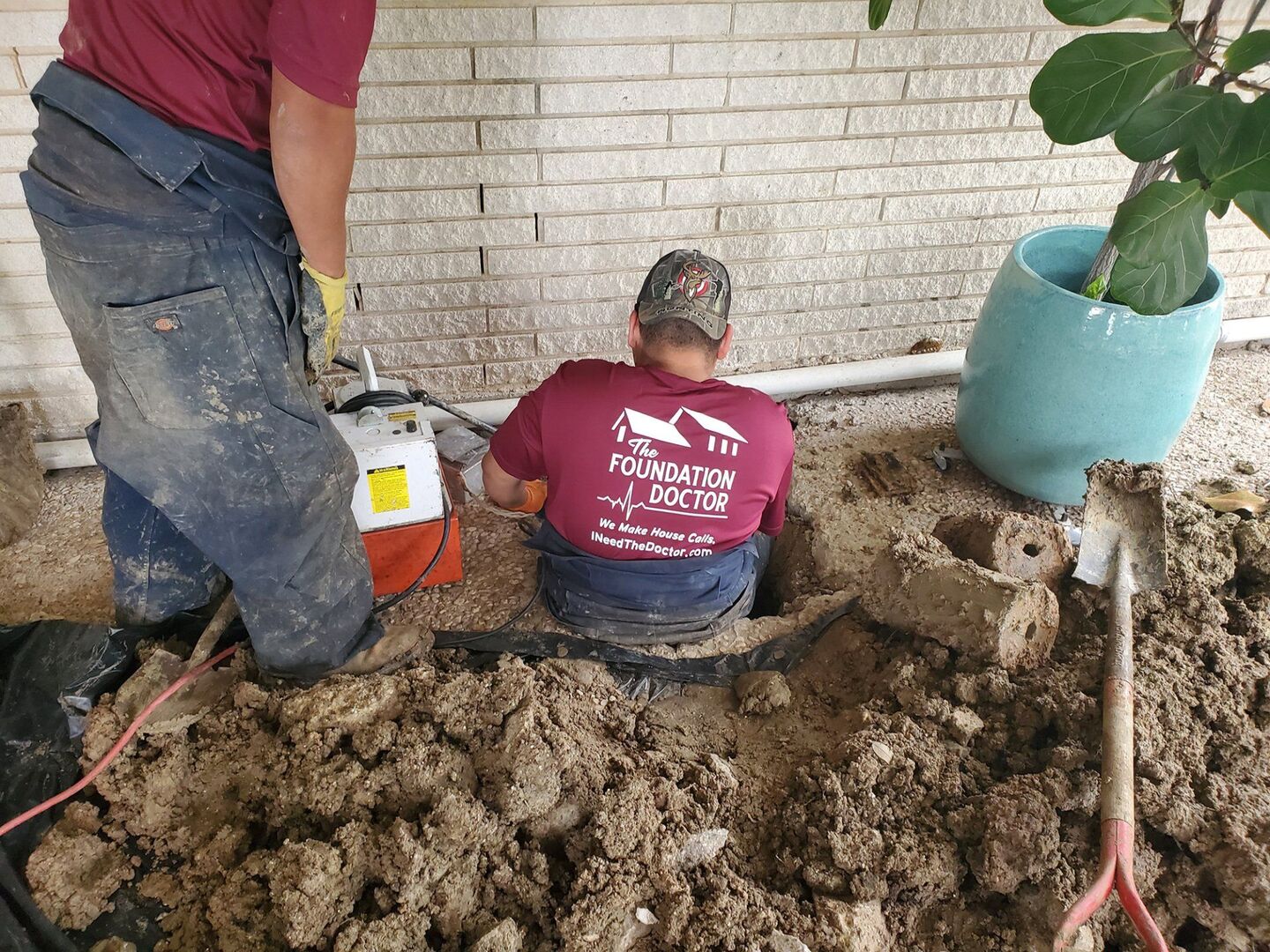 The Foundation Doctor crew at a repaired brick home