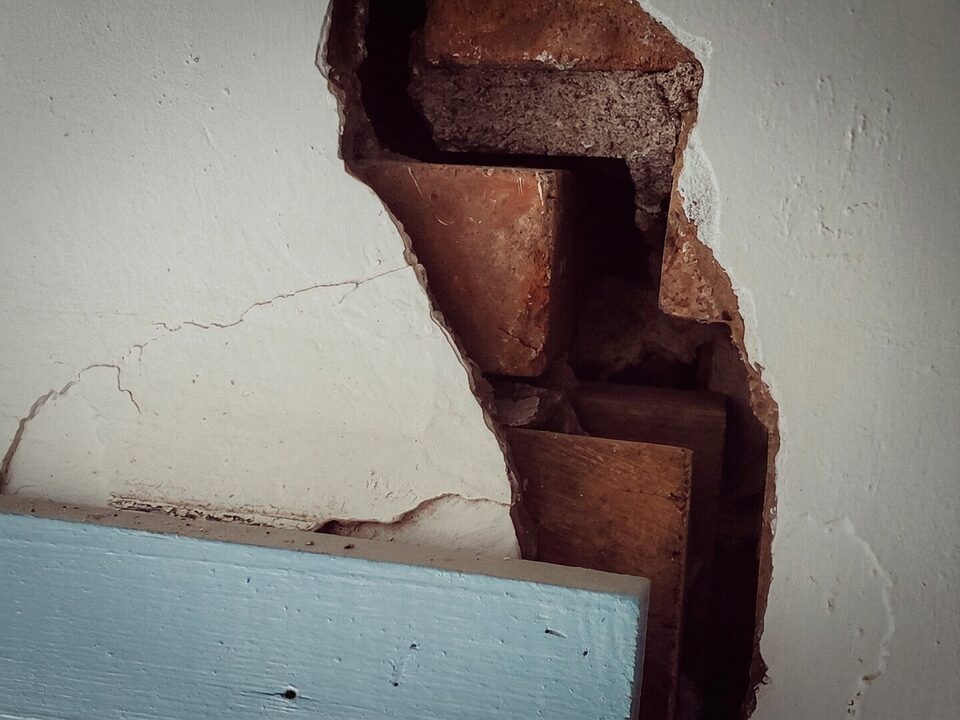 Stair-step crack through interior drywall