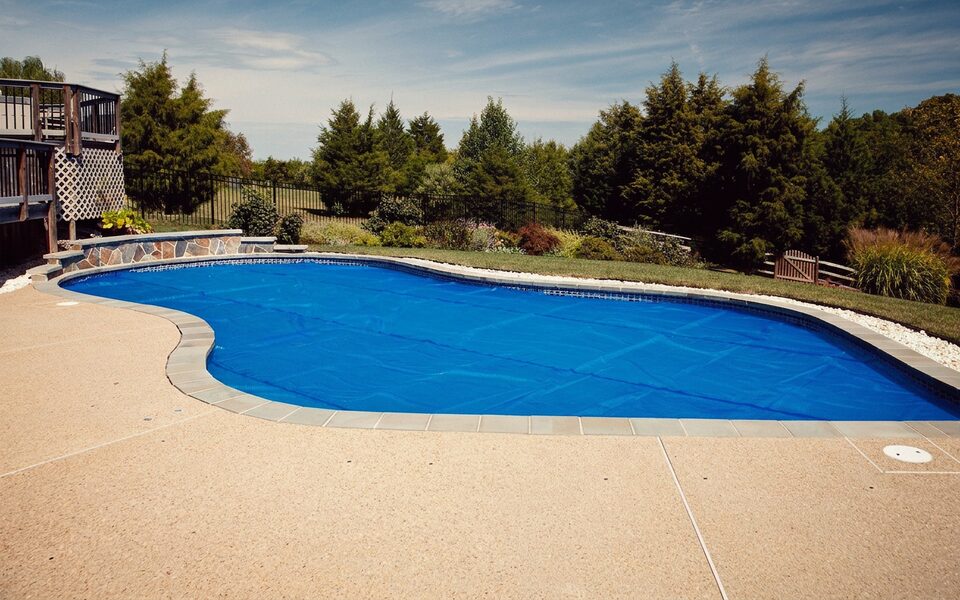 Backyard pool and deck restored to level